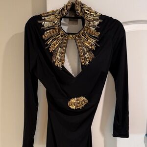 Elegant Black Dress with Gold Embellishments